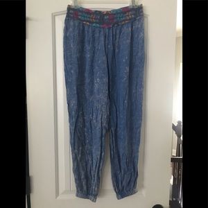 Blue genie pant, multicolored embroidered waist.